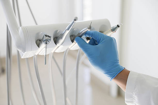 Professional Invisalign Clear Aligners technician working in Luna Pier, MI